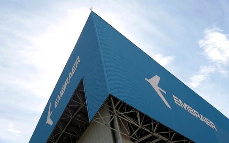 74568834_file_photo_the_logo_of_brazilian_jets_maker_embraer_is_seen_on_a_factory_in_sao_jose_do